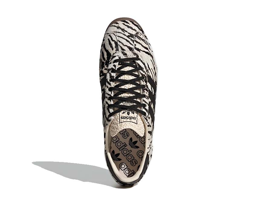 Scarpe da ginnastica femminili in stile vintage con fantasia zebrata.