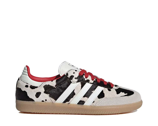 Scarpe sportive basse in pelle con stampa mucca per donna