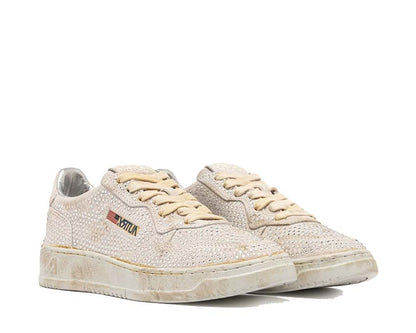 Scarpe sportive basse da donna in pelle con inserti trasparenti.