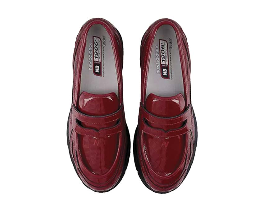 Scarpe sportive rosse con motivo a pelle di coccodrillo