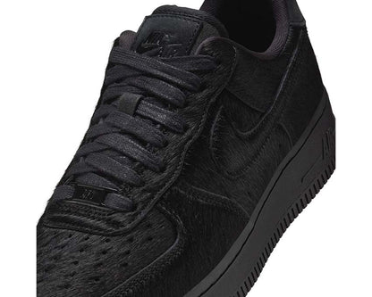 Scarpe sportive in pelle scamosciata nera con dettagli in pelliccia sintetica