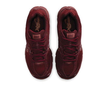 Scarpe da corsa ammortizzate per donna in tonalità rosso seppia